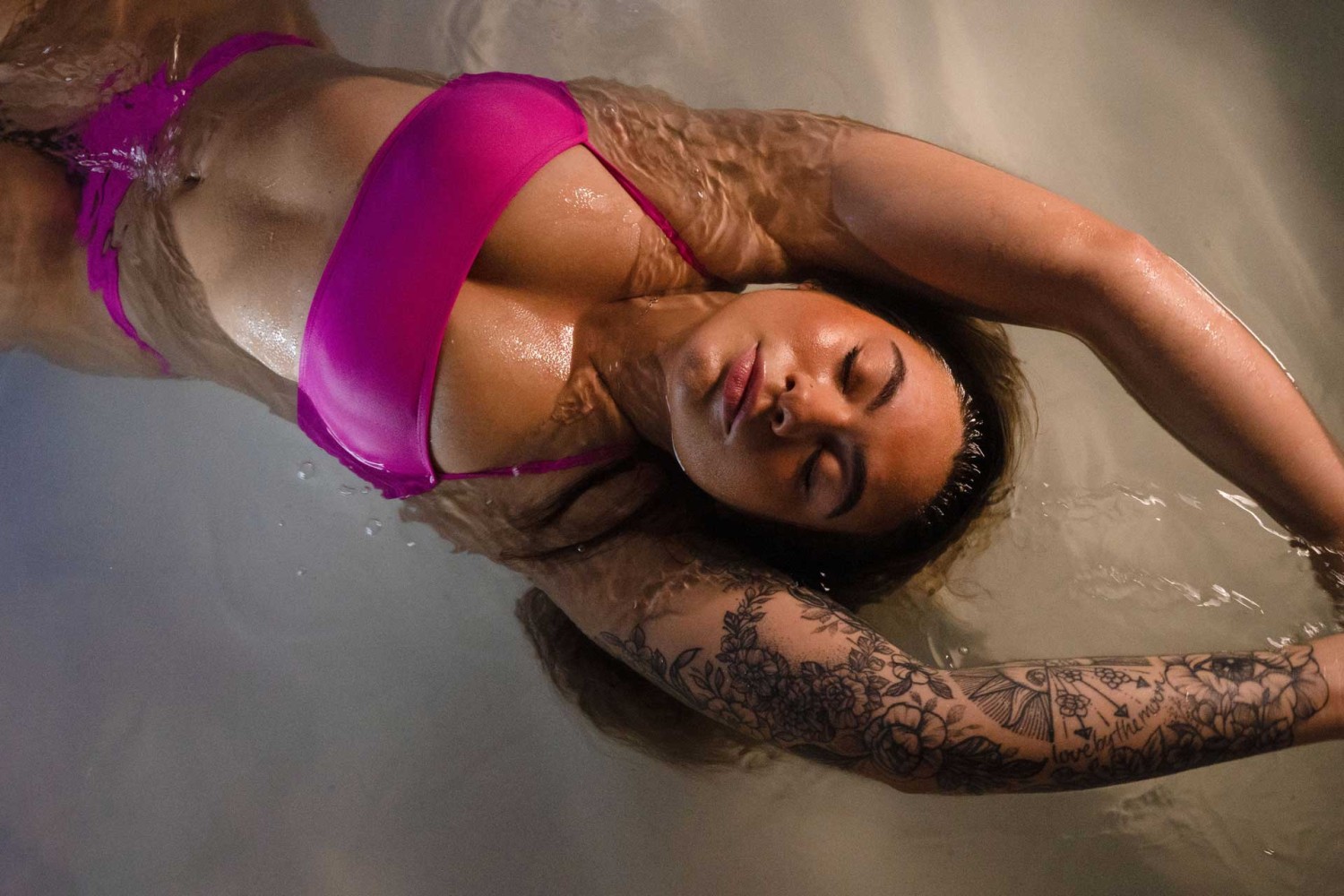 woman floating in float tank