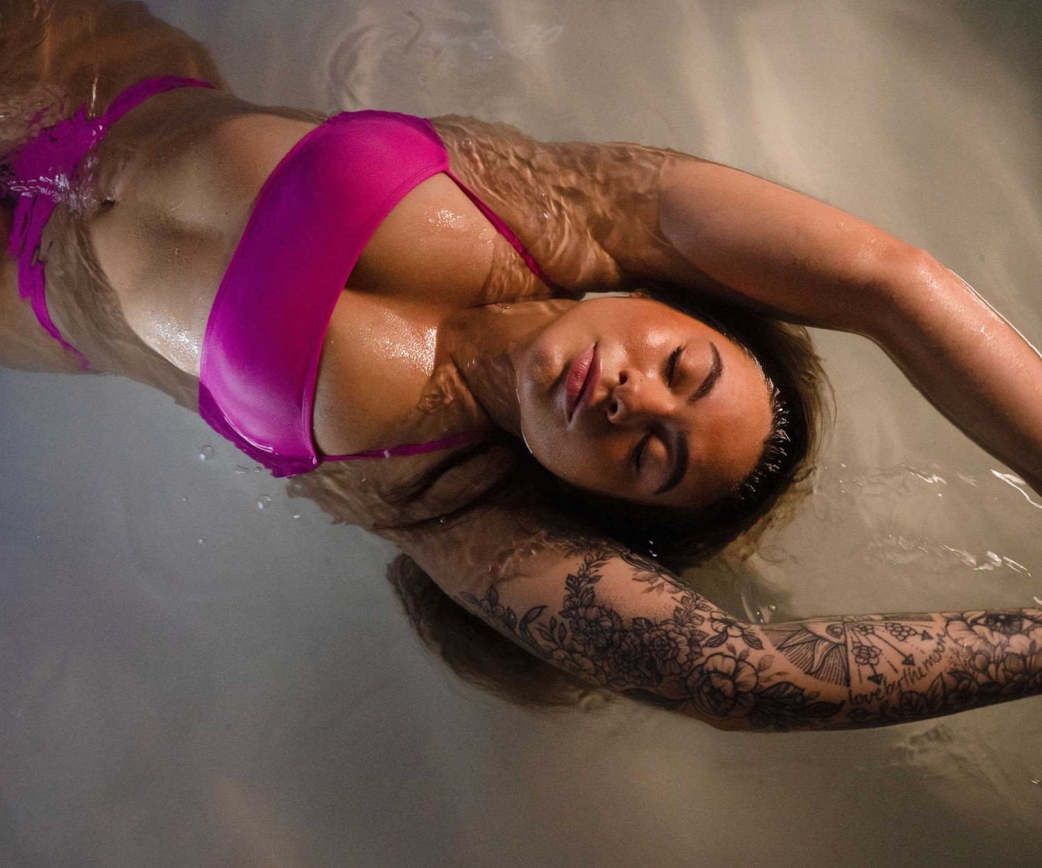 woman floating in float tank